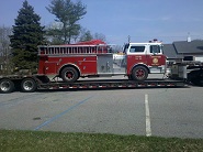 fire truck on trailer 102 truck transport photo