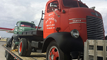 antique trucks on trailer truck transport photo